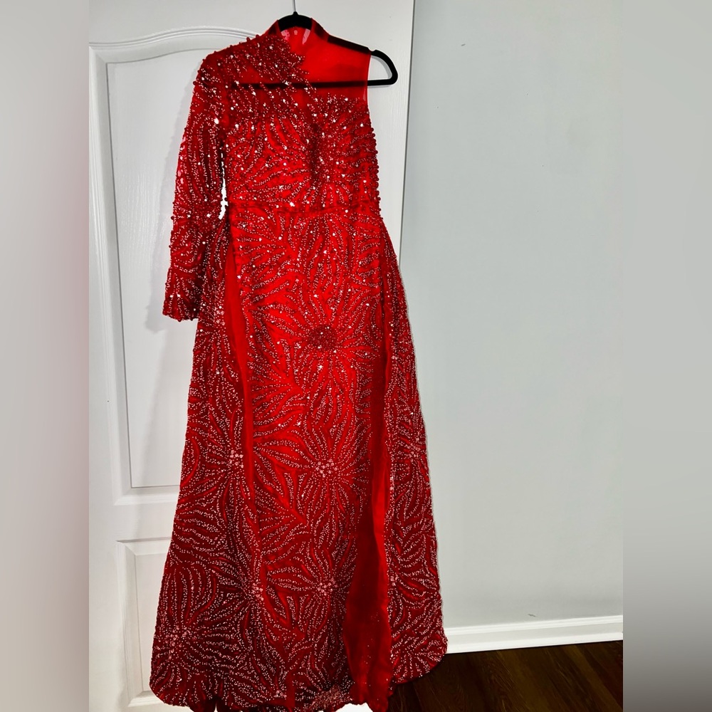 Never worn. New, with original bag. 
Customer made dress.